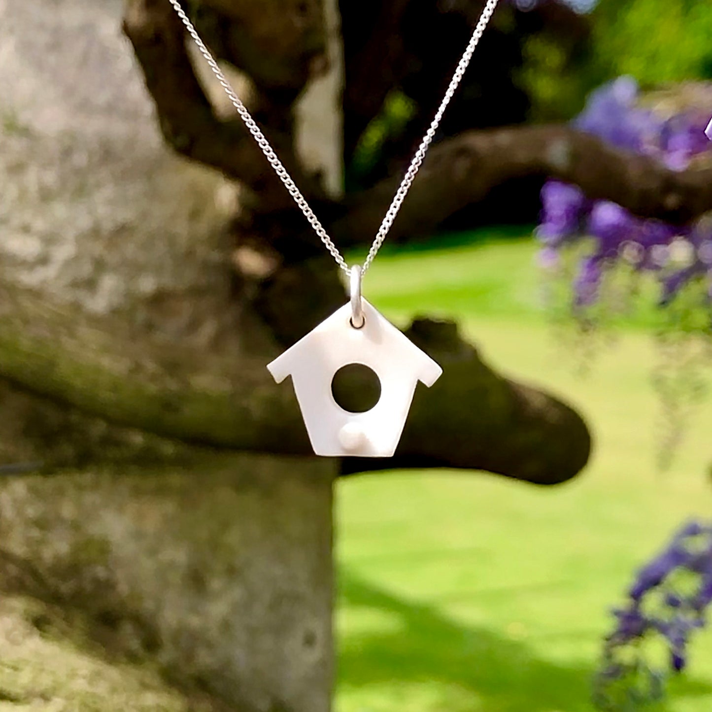 Heart and Wilde Porcelain Birdhouse Necklace in garden