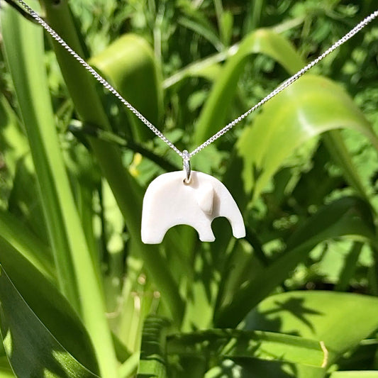Heart and Wilde Porcelain Elephant Necklace in garden
